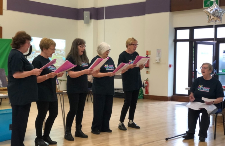 Our Choir Group singing in front of an audience