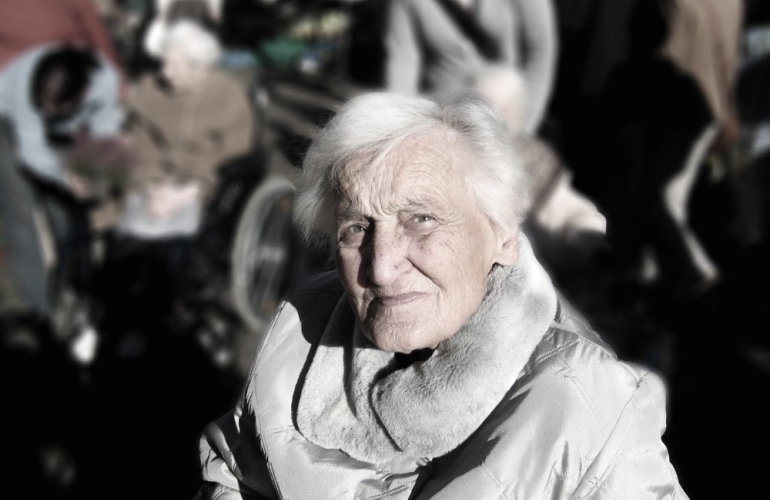 Elderly lady looking at camera